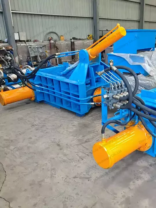 Metal recycling baler in the factory