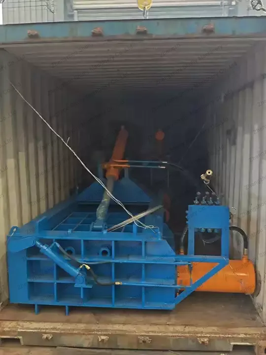 Metal scrap baler loading